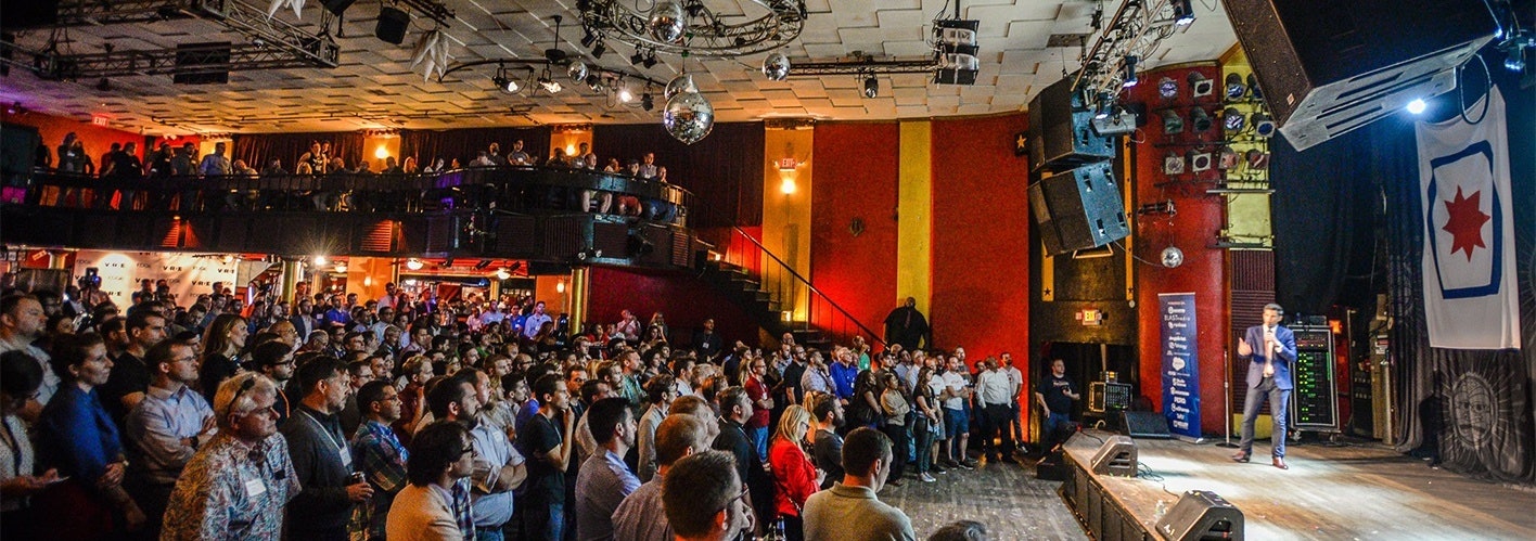 crowd and a speaker at powderkeg